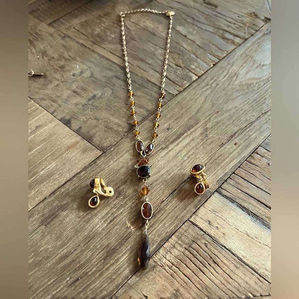 Matching necklace and clip on earrings.